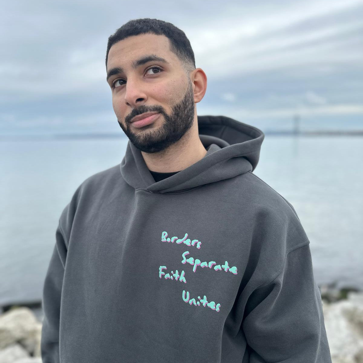 Separated By Borders United Through Faith Hoodie